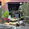 FFW Schwalmtal: Feuerwehr löscht Garagenbrand im Hinterhof eines Wohngebäudes